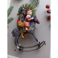 Devil Krampus with Misbehave Girl on rocking horse Unique Christmas Ornament